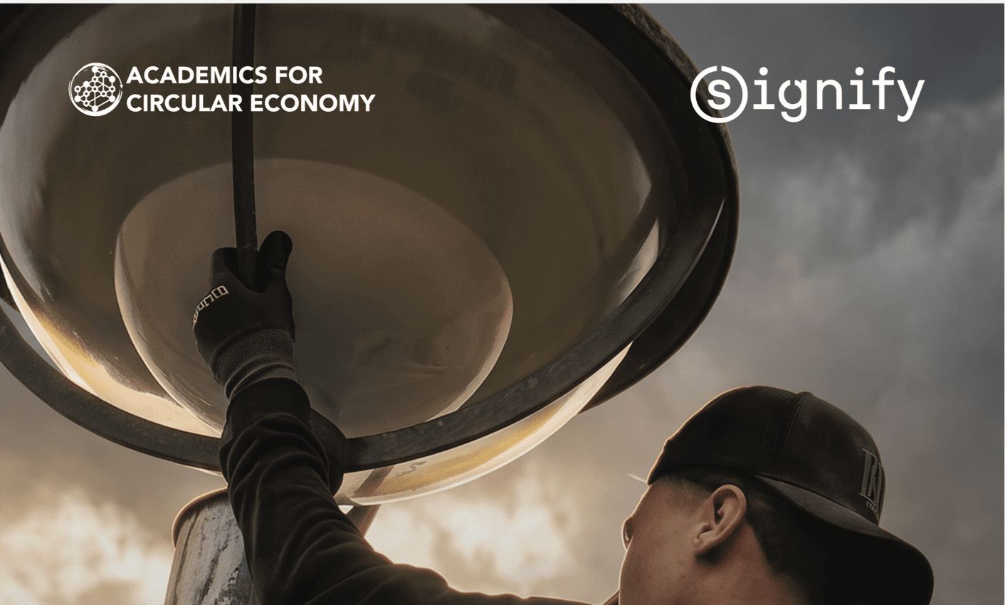Technicians retrofitting LED luminaires on existing street lighting poles in an urban tunnel
